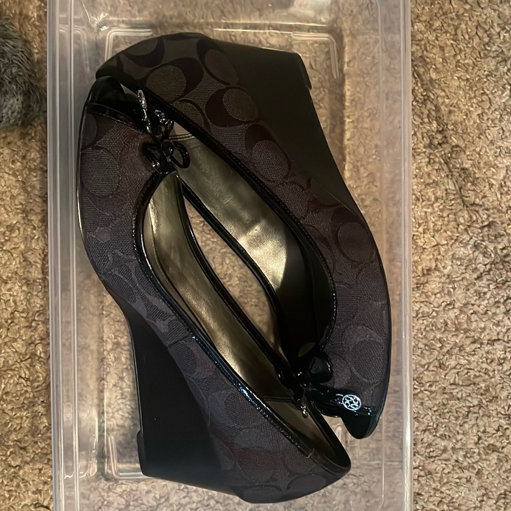 Open toe black Coach wedges